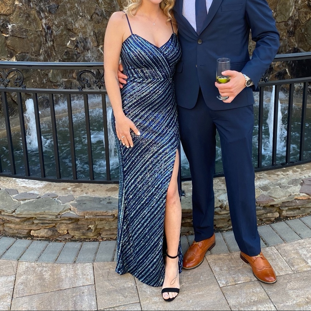 Long blue sequined spaghetti strap formal dress